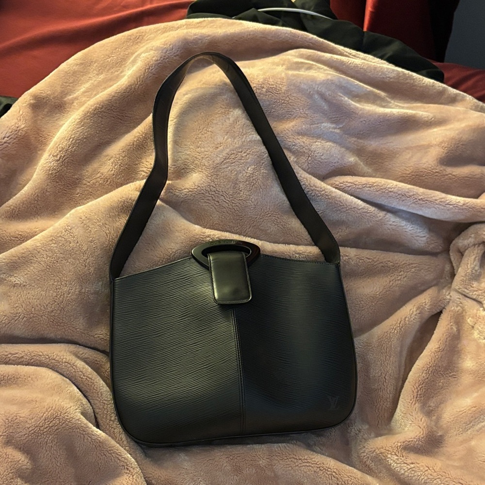 Louis Vuitton
Epi Leather Reverie